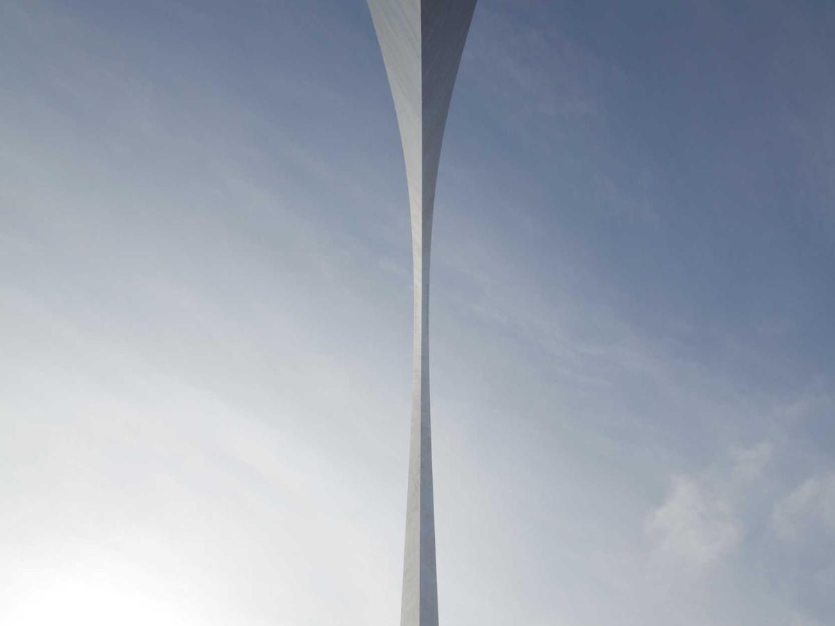 A tall arch structure reaching into the sky